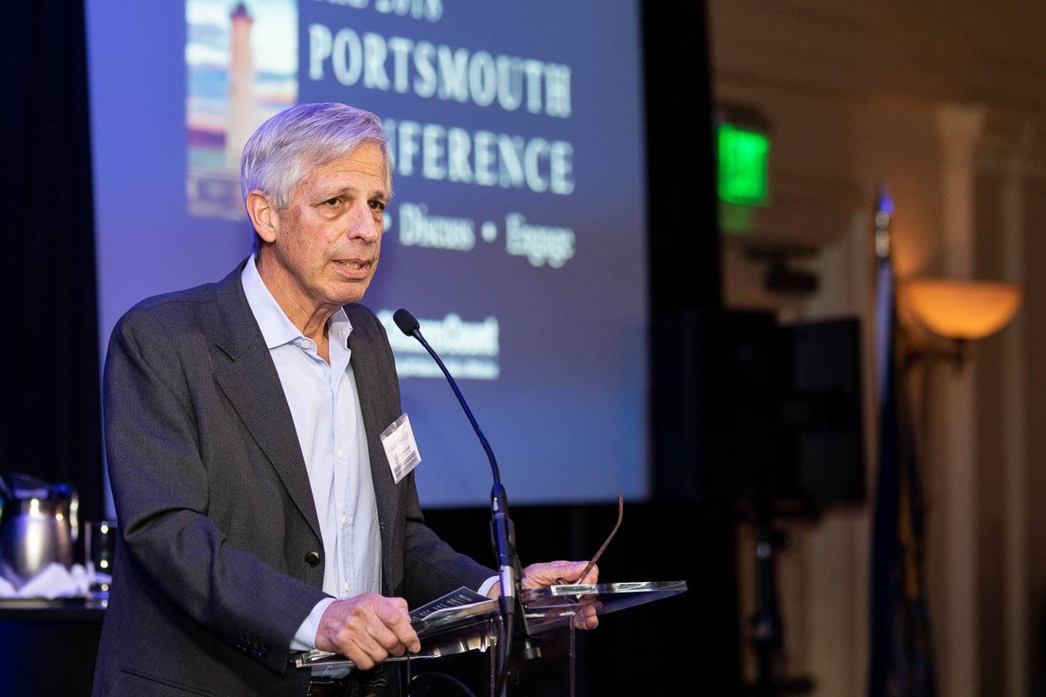 A conference presentation photographed from the audience